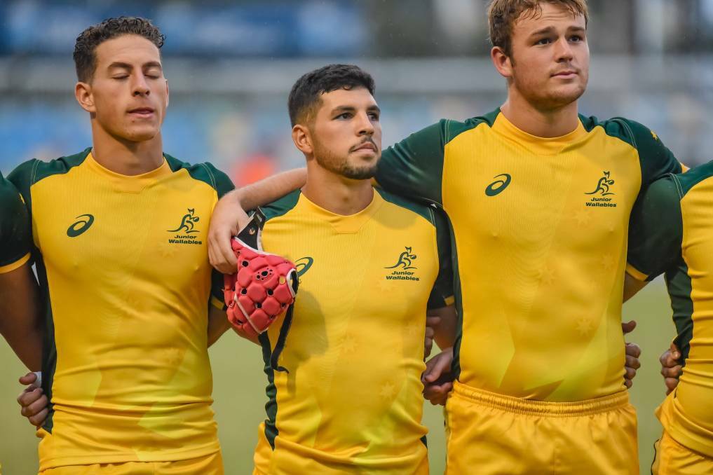 Pride: Triston Reilly stands with his teammates during the national anthems at the Under-20s Oceania Championships in May. Photo: Stephen Tremain