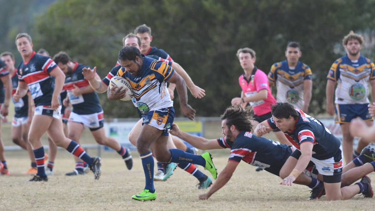 A Macleay Valley Mustangs player breaks the Old Bar Pirates' defensive line. Photo: Penny Tamblyn