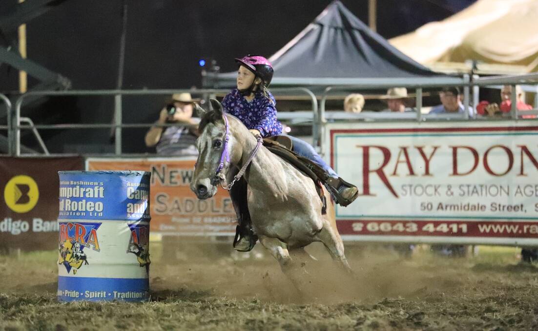 Franki Ward competes in the Under-8 to 11 barrel race.