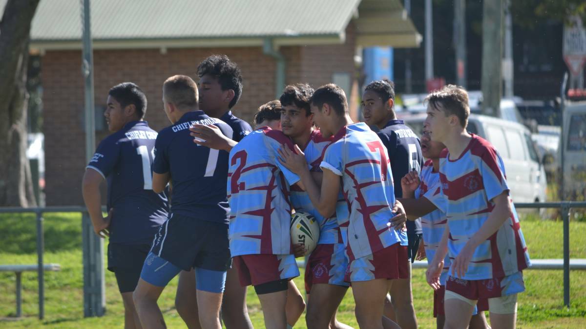 Four-pointer: Melville High School Under-14s side celebrates a try in their quarter final match against Chifley College. Photo: Callum McGregor.