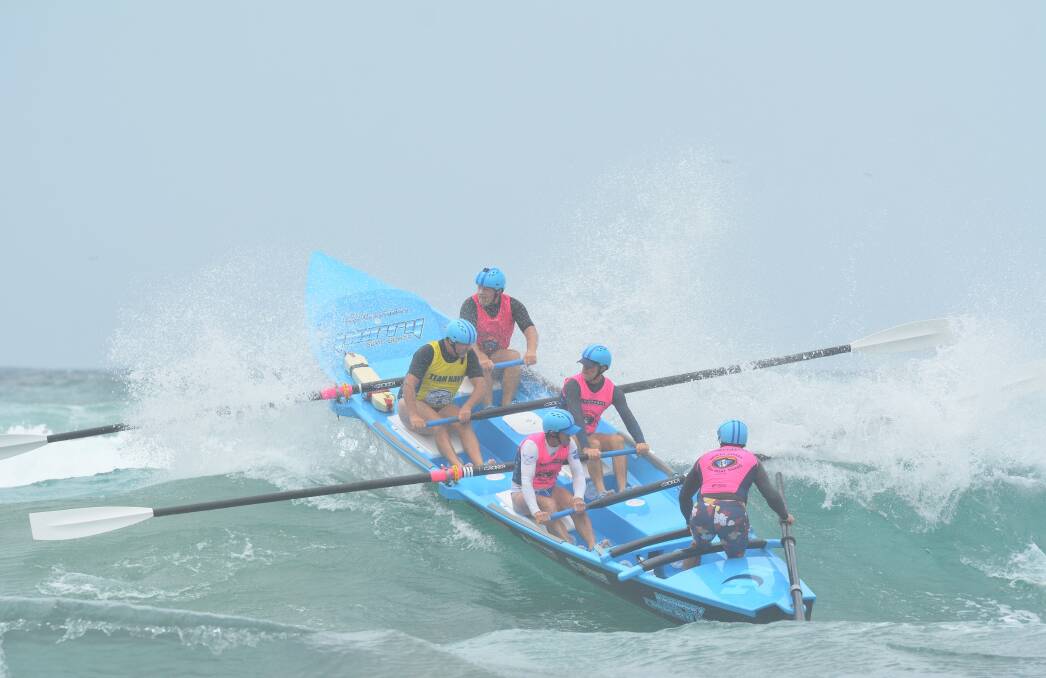 Swell: The Masters 200s tackle a wave at the North Coast Surf Boat Series round held at Bonny Hills. Photo: Penny Tamblyn.
