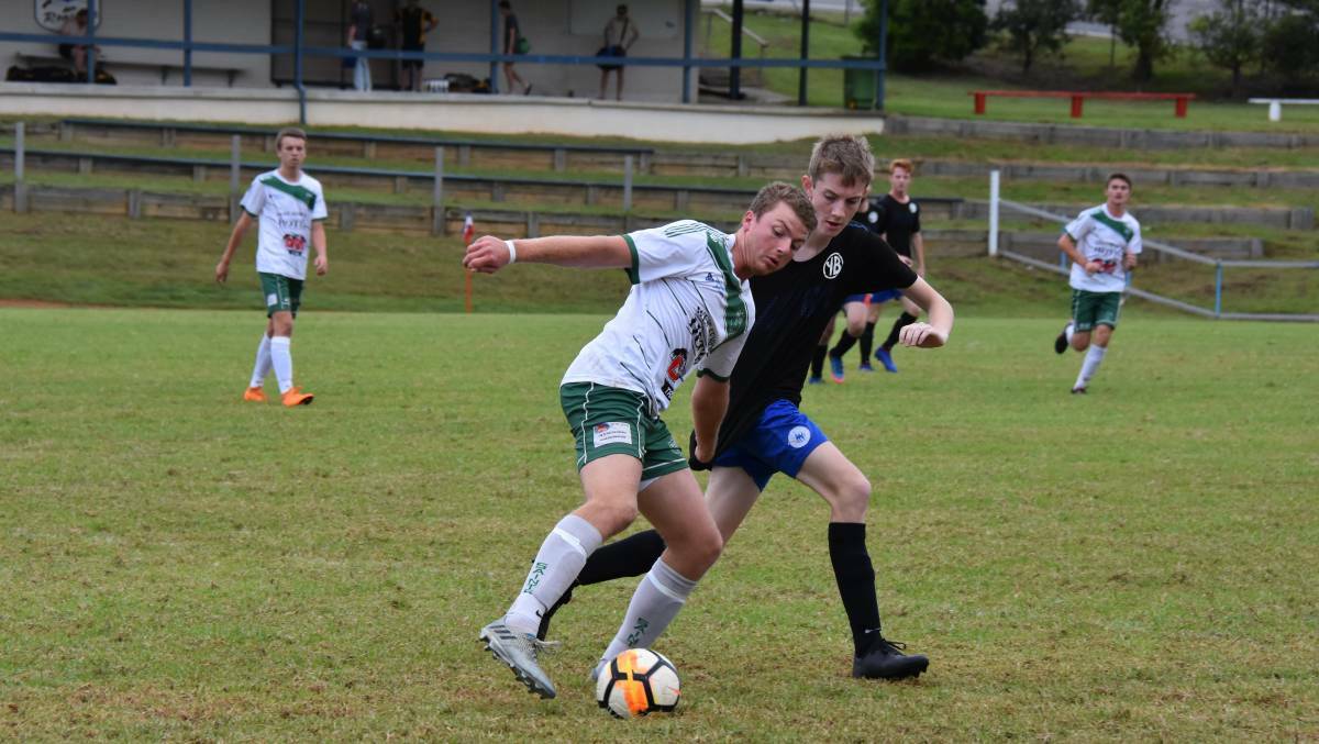 Shoulder-to-shoulder: Kempsey Saints' start to the Premier League season will be delayed as they play an FFA Cup match this Saturday. Photo: Christian Knight.