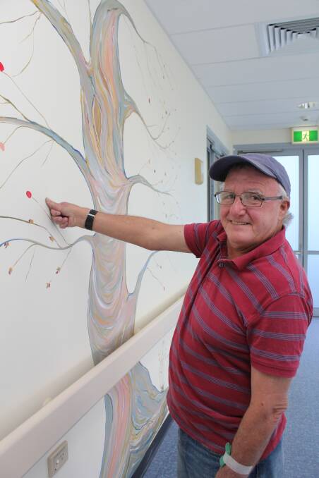 Gary Paine leaves his mark on the MNCCI’s Finishing Tree, funded by a donation from Kempsey’s Lilli Pilli Ladies.
