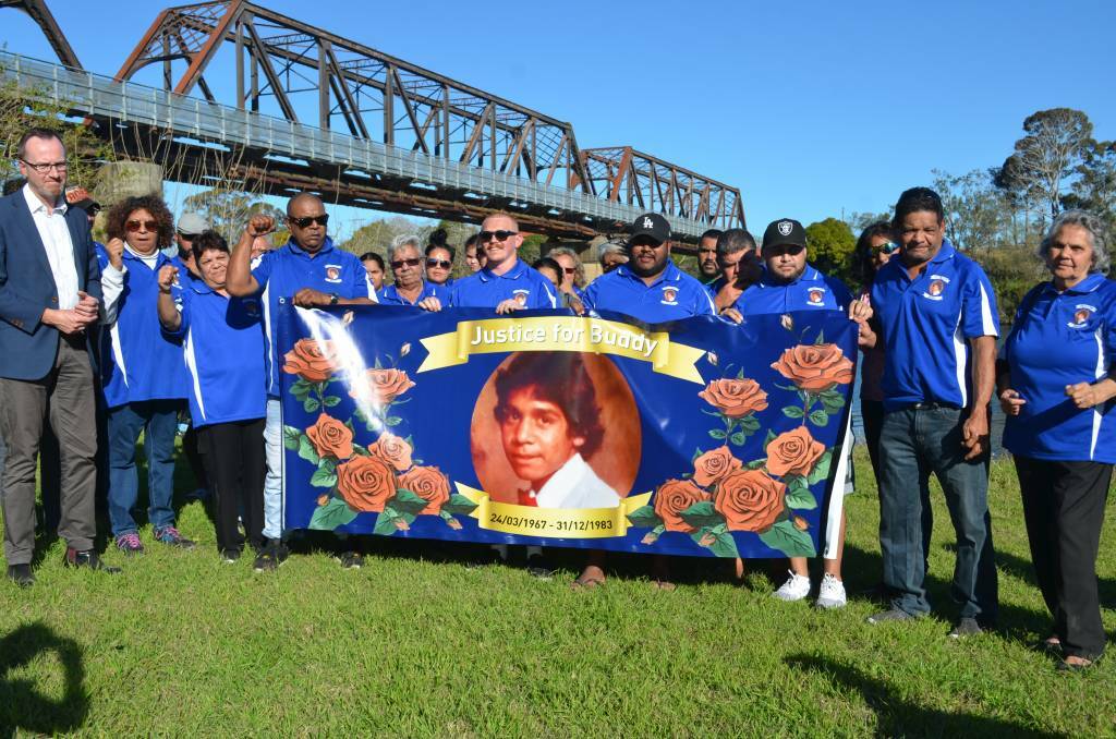 Family and friends of Lewis Buddy Kelly and Greens Aboriginal Justice spokesperson David Shoebridge gathered at the last location Buddy was seen alive to announce the investigation reopened in July this year. Photo: Callum McGregor.