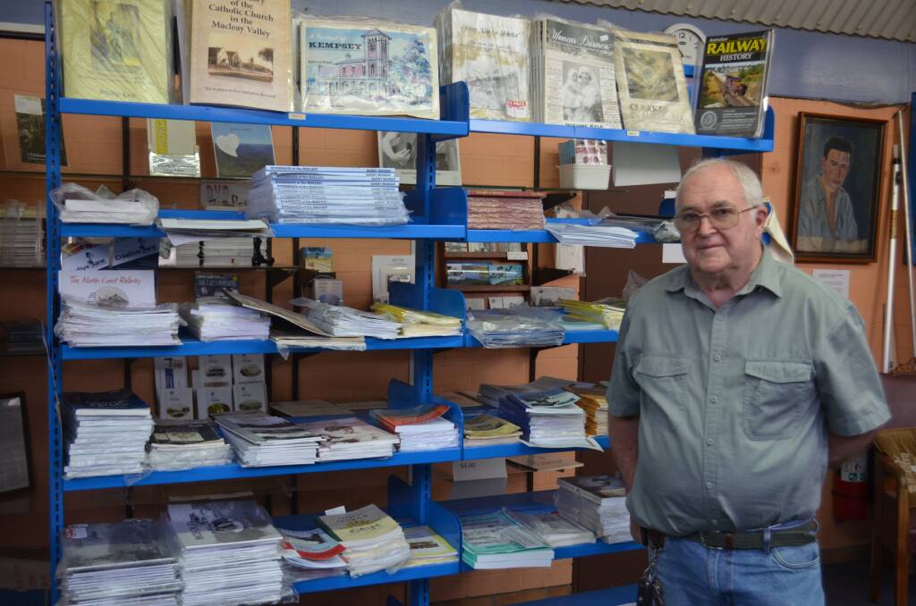 Historical Society president Phil Lee with the books for sale at the Kempsey Museum in South Kempsey. Photo: Callum McGregor