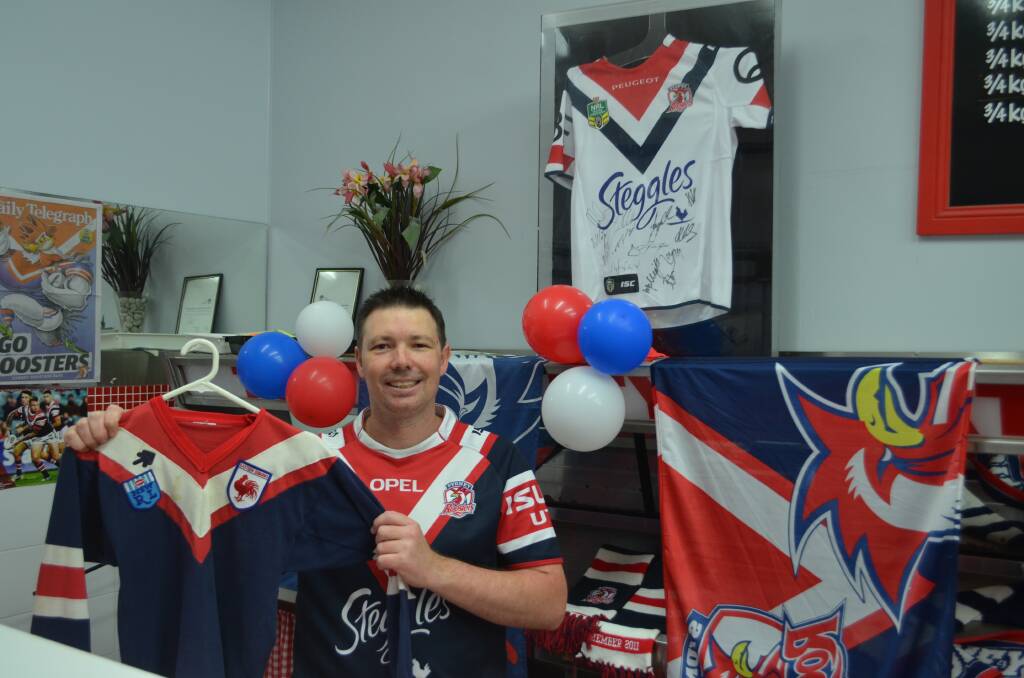 Lifelong Roosters fan Jason Crilley will host a barbecue with friends when he watches the tri-colours take on the Canberra Raiders in the NRL grand final this Sunday. Photo: Callum McGregor