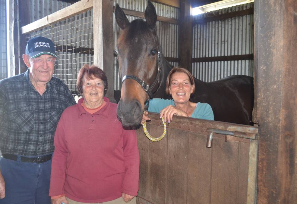 Horsing around: Peter Ball (left) with wife Janice and daughter Gaye (right). Photo: Callum McGregor.