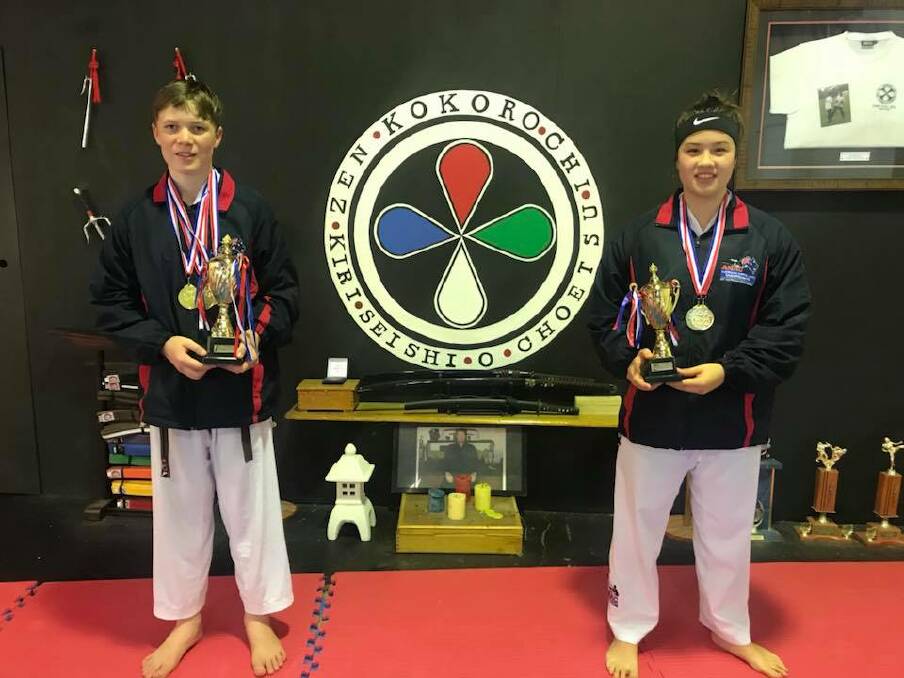 Victorious: Tristan (right) and Chelsea (left) with their prizes after their first international tournament. Photo: Supplied.