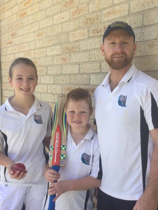 New leader: Matt Ryan, who is the new South West Rocks Cricket Club president, with his children. Photo: Supplied.
