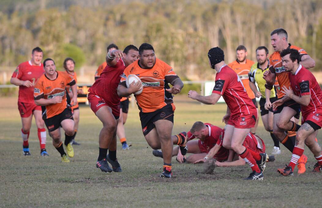 Charge: Forward Tasi Afoa carries the ball forward for the Cannonballs against the Pirates last season. Photo: Penny Tamblyn.