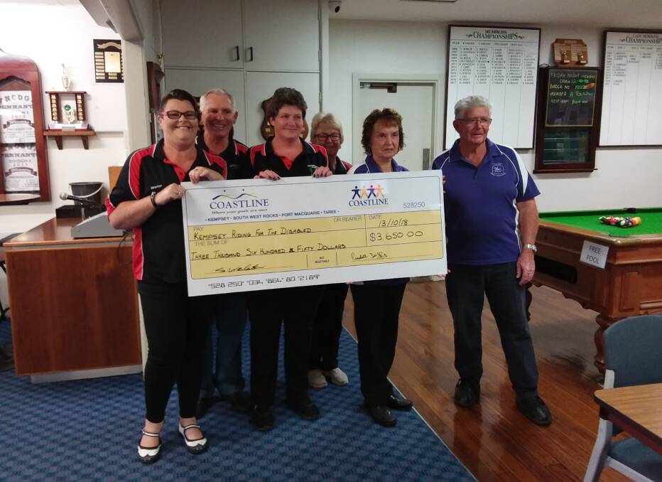 Generosity: Frederickton Golf Club donated thousands to the Riding for the Disabled. Photo: Supplied.