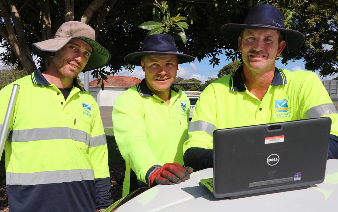 Kempsey Shire Councils Brett Liddell, Cameron Britt and Nap Lewis plan their next job in outdoor maintenance work.