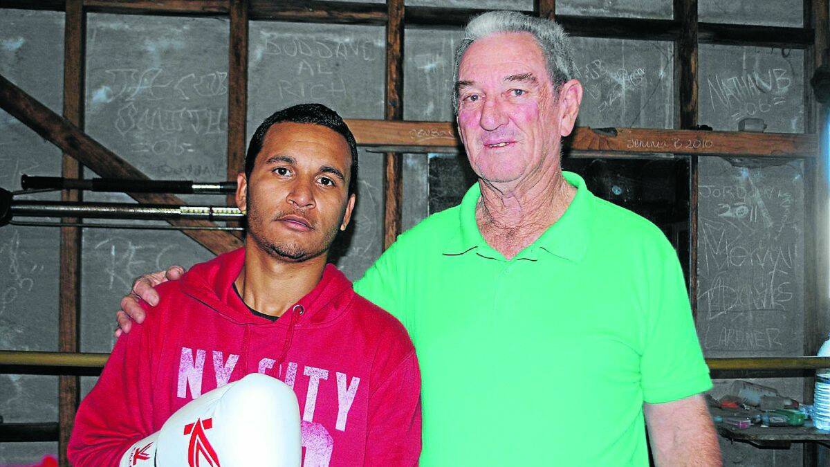 Student and mentor: Boxer Alistair Larnder  with his trainer George Ptolemy