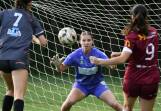 Mid Coast goalie Grace Davies makes a save during the clash against Warners Bay in a clash at the Taree Zone Field earlier this season. Mid Coast won the match 2-0.