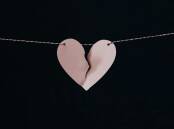 Picture is a broken heart on a fishing wire. Picture is by Kelly Sikkema