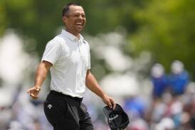 Xander Schauffele is all smiles after his record-breaking first-round of 62 at Valhalla. (AP PHOTO)