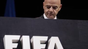 Gianni Infantino says FIFA will seek independent legal advice on a proposal to suspend Israel. (AP PHOTO)