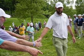 World No.1 Scottie Scheffler greets fans during a solid first round at the PGA Championship. (AP PHOTO)